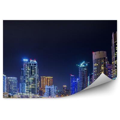 Öntapadó fotótapéta Város panoráma felhőkarcolók folyó pálmafák ég