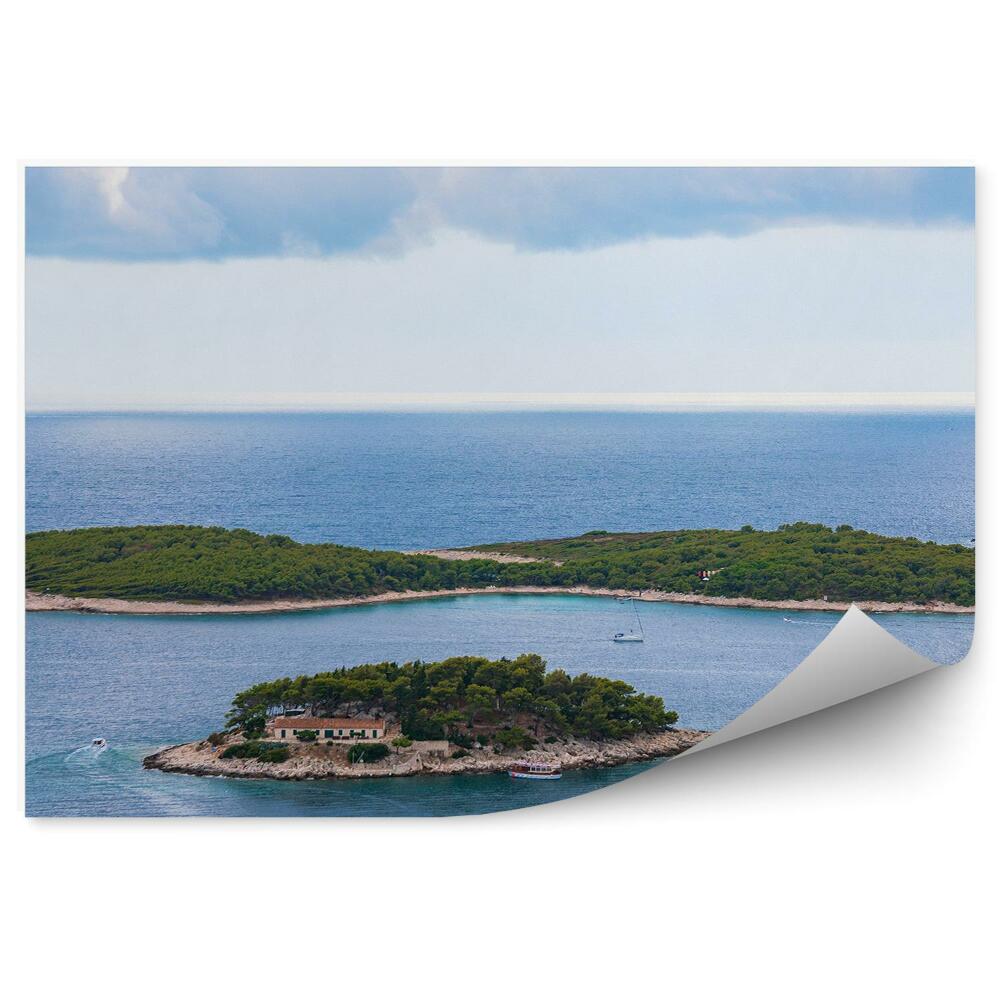 Öntapadó fotótapéta Szigetek növények épületek jachtok óceán ég felhők