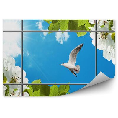 Fotótapéta Fehér madár virágzó fa kék ég