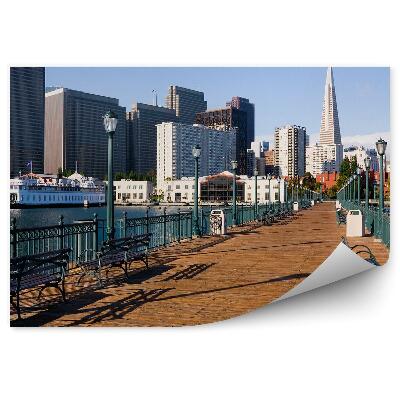 Modern fotótapéta Felhőkarcolók komp híd padok lámpák óceán ég