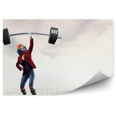 Fotótapéta Bohóc nő a járdán súlyemelést