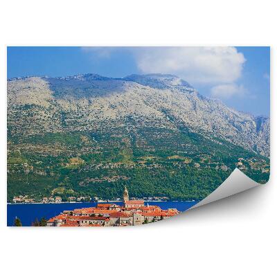 Öntapadó fotótapéta A hegyi természet városi házakat ültet