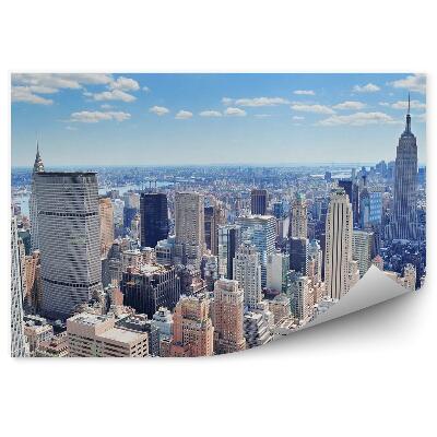 Poszter tapéta New york felhőkarcolók épületek folyó égbolt felhők manhattan