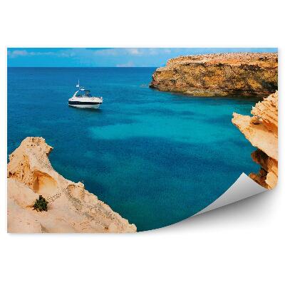 Poszter tapéta part sziklák Baleár-szigetek hajó víz
