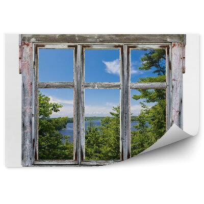 Fotótapéta Festői kilátás egy régi ablak keretein keresztül