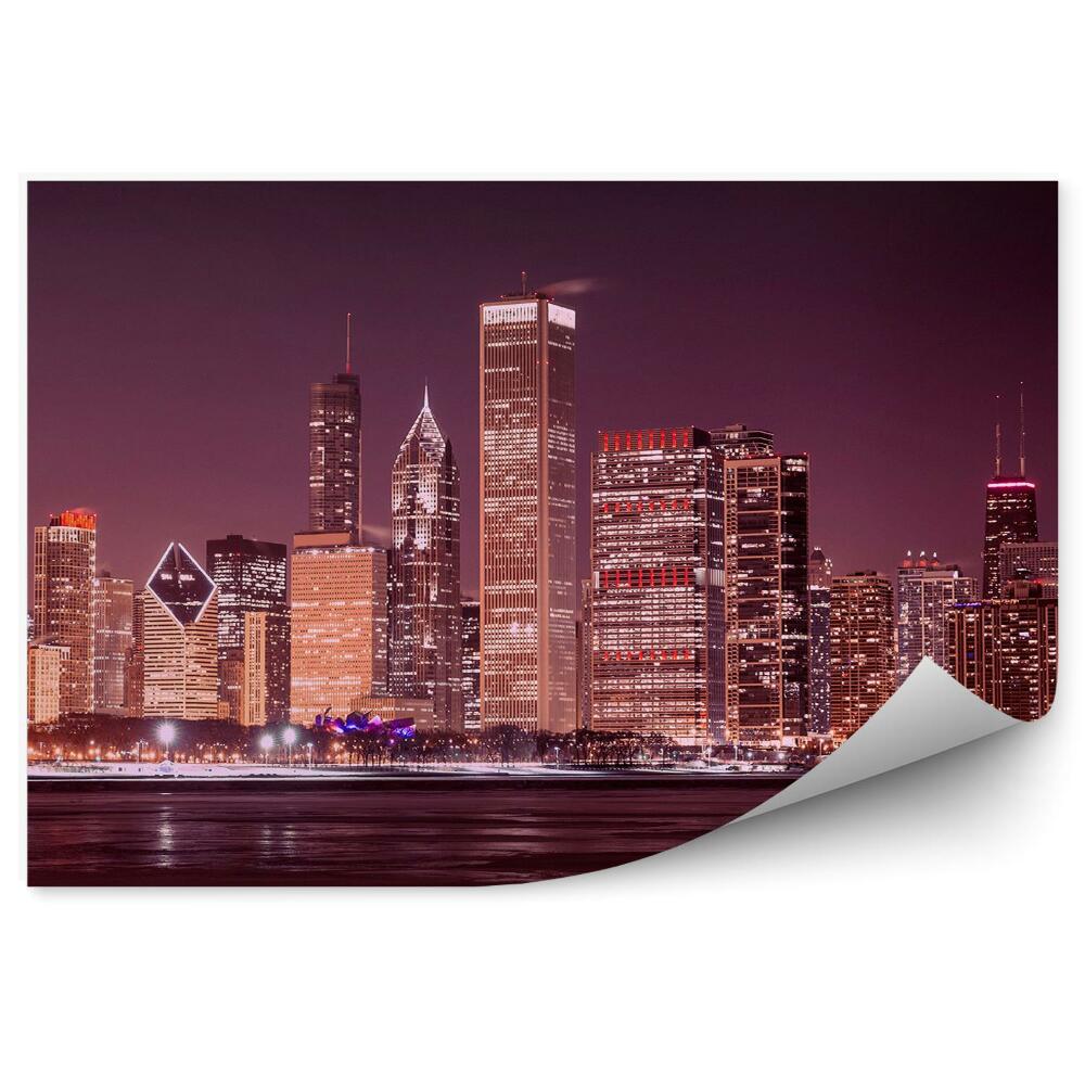 Poszter tapéta Chicago felhőkarcolók megvilágítják az éjszakai óceánt