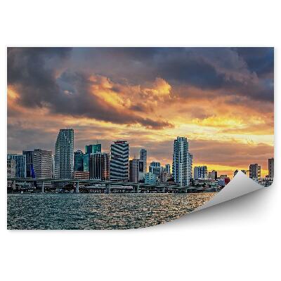 Öntapadó fotótapéta Felhőkarcolók város óceán ég felhők naplemente