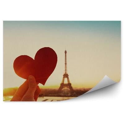 Fotótapéta Papírból kivágott szerelmes szív az Eiffel-torony hátterében