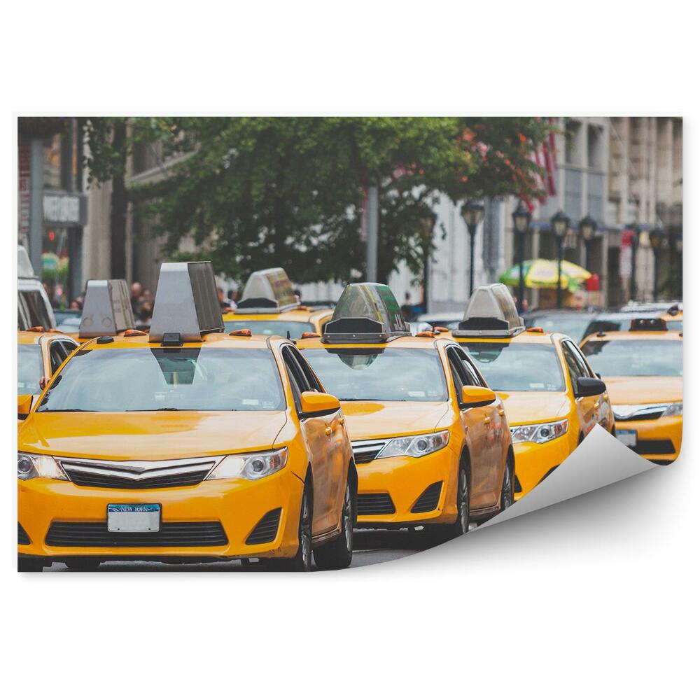Fotótapéta Tipikus sárga taxik az utcán