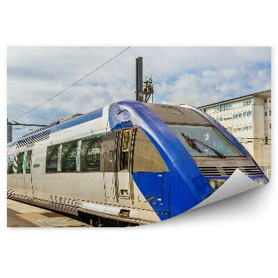 Fotótapéta Az épületen kívüli peron vonattal utazik