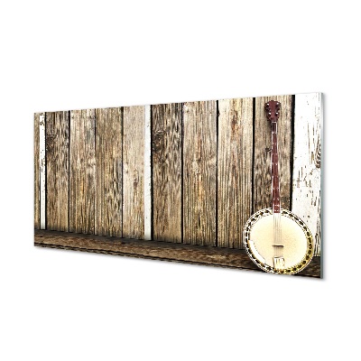 Ukulele a kerítésnek dőlve Üvegkép nyomtatás