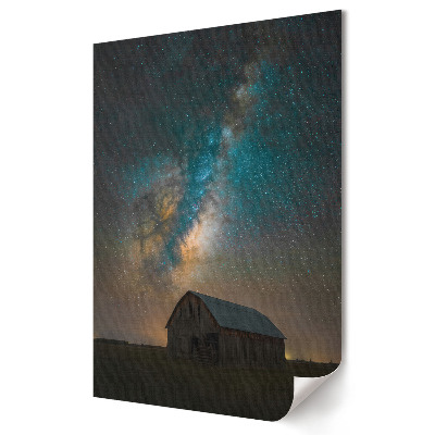 A galaxis a régi település felett fali poszter